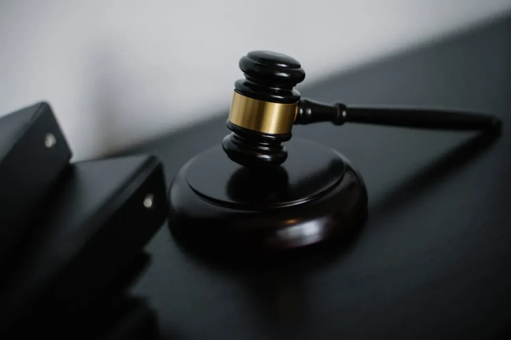 Court gavel symbolizing legal action.