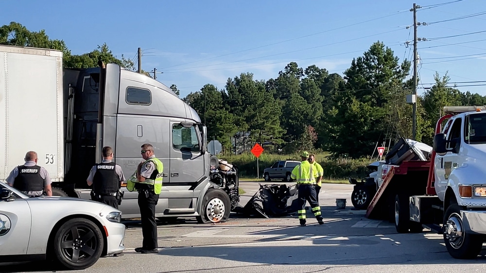 Police and tow crew responding to a serious truck accident in Nashville.