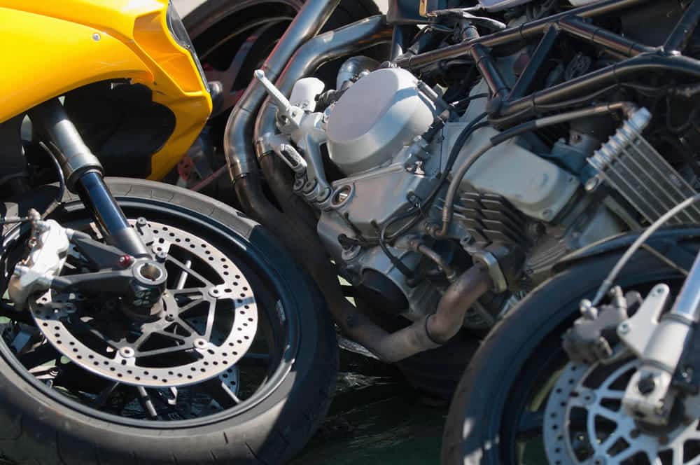 Image is of damaged motorcycles after a collision, concept of determining comparative fault in a Nashville motorcycle claim